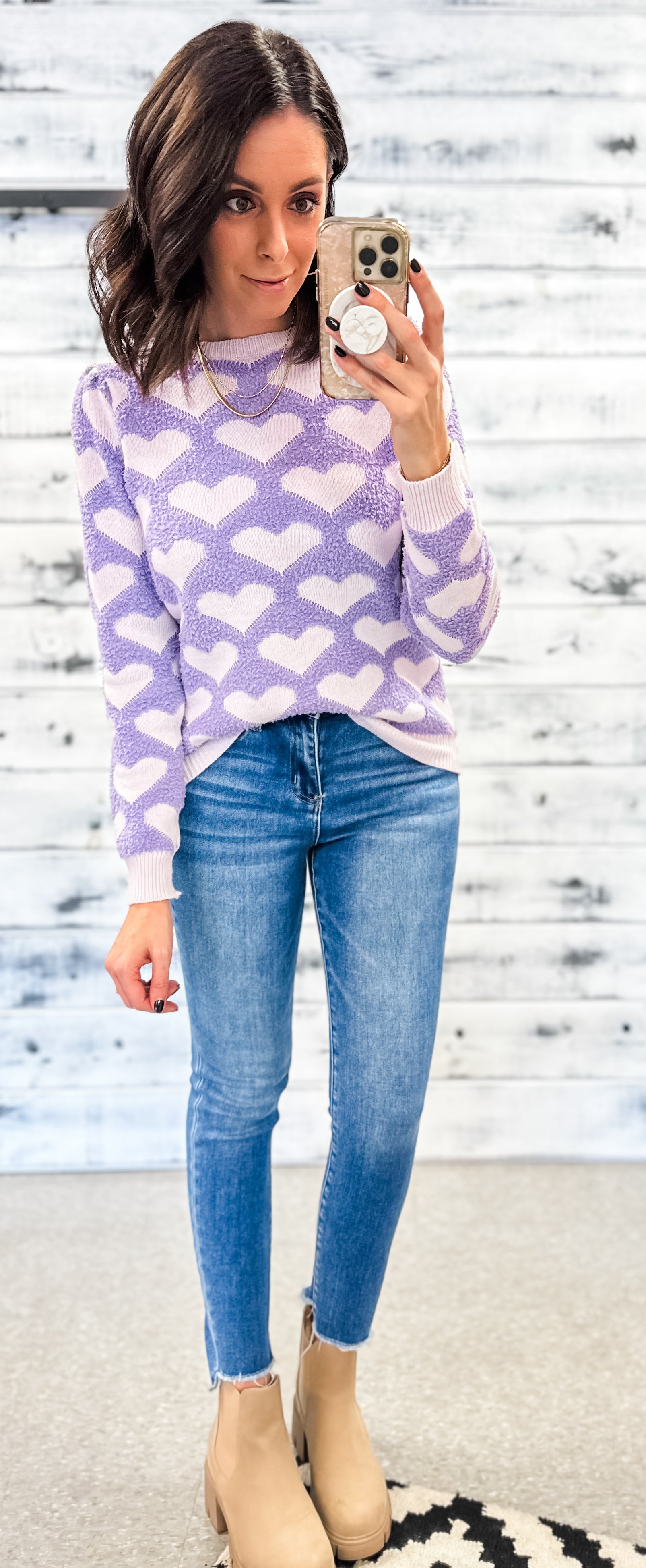 purple sweater with blue jeans outfit